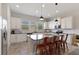 Modern kitchen with white cabinets, granite counters and island at 2321 Lobelia Dr, Lake Mary, FL 32746