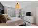 Bedroom with king-size bed and window seating area at 2321 Lobelia Dr, Lake Mary, FL 32746