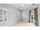 Bedroom with sliding glass doors leading to a patio at 2626 Raccoon Run Ln, Orlando, FL 32837