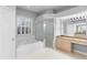 Bathroom boasts double sinks, a soaking tub, and a walk-in shower at 2626 Raccoon Run Ln, Orlando, FL 32837