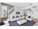 Bright living room with white furniture and open concept at 2626 Raccoon Run Ln, Orlando, FL 32837