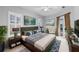 Bright main bedroom with king-size bed and private access to the pool at 2626 Raccoon Run Ln, Orlando, FL 32837