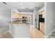 Kitchen boasts granite countertops and stainless steel appliances at 2626 Raccoon Run Ln, Orlando, FL 32837