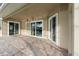 Spacious covered patio with sliding glass doors at 2626 Raccoon Run Ln, Orlando, FL 32837
