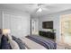 Bedroom with large closet and ensuite bathroom at 2626 Raccoon Run Ln, Orlando, FL 32837