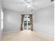Bedroom with sliding glass doors and pool view at 2626 Raccoon Run Ln, Orlando, FL 32837