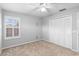Bedroom with window shutters and ceiling fan at 2626 Raccoon Run Ln, Orlando, FL 32837