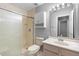 Bathroom with updated vanity, toilet and shower at 2626 Raccoon Run Ln, Orlando, FL 32837