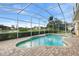 Inviting kidney-shaped pool with screened patio at 2626 Raccoon Run Ln, Orlando, FL 32837