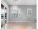 Bright dining area with pool access and view at 2626 Raccoon Run Ln, Orlando, FL 32837
