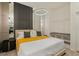 Bright bedroom with a king-size bed and built-in shelving at 5937 High Seas Dr, Orlando, FL 32821