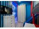 Fun ' bedroom with a bunk bed, slide, and TV at 5937 High Seas Dr, Orlando, FL 32821
