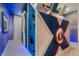 Superhero-themed bedroom with a custom bed and accent lighting at 5937 High Seas Dr, Orlando, FL 32821