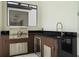 Modern outdoor kitchen with grill, sink, and wine cooler at 5937 High Seas Dr, Orlando, FL 32821
