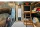 bedroom with bunk beds and dinosaur mural at 5937 High Seas Dr, Orlando, FL 32821