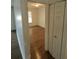 Bright bedroom with wood-look floors and a spacious closet at 6008 Village Cir # Ge, Orlando, FL 32822