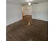 Spacious living room with hardwood floors and neutral walls at 6008 Village Cir # Ge, Orlando, FL 32822