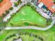 Aerial view of a section of the golf course at 120 Vizcaya Ct, Poinciana, FL 34759