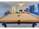 Fun game room with a pool table and plenty of space to play at 1423 Thunderbird Rd, Davenport, FL 33896