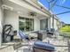 Outdoor patio with seating area and fire pit at 1490 Olympic Club Blvd, Champions Gate, FL 33896