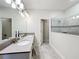 Bathroom with double vanity and large shower at 1490 Olympic Club Blvd, Champions Gate, FL 33896