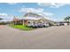 Community center with parking lot and several cars parked at 235 Royal Palm Dr, Davenport, FL 33837