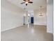 Bright and airy living room with tile floors at 235 Royal Palm Dr, Davenport, FL 33837