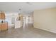 Kitchen area with wooden cabinets and a breakfast bar at 2713 Sw 158Th St, Ocala, FL 34473