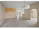 Living room with high ceilings and decorative wall texture at 2713 Sw 158Th St, Ocala, FL 34473
