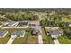 Aerial view of a single Gathering home with driveway and yard at 2713 Sw 158Th St, Ocala, FL 34473