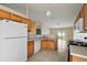 Open concept kitchen with a breakfast bar and access to the living area at 2713 Sw 158Th St, Ocala, FL 34473