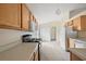 Bright kitchen features wood cabinets, tile flooring, and stainless steel appliances at 2713 Sw 158Th St, Ocala, FL 34473