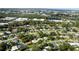 Aerial view of residential neighborhood with single-Gathering homes and lush green landscaping at 2816 Paine Ln, Orlando, FL 32826