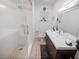 Modern bathroom with a glass shower, floating vanity, and updated fixtures at 2816 Paine Ln, Orlando, FL 32826