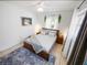 Main bedroom with a comfortable bed and plenty of natural light at 2816 Paine Ln, Orlando, FL 32826