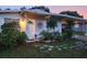Charming ranch home with landscaped yard and covered carport at 2816 Paine Ln, Orlando, FL 32826