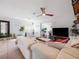 Spacious living room with comfortable seating and large TV at 2816 Paine Ln, Orlando, FL 32826