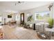 Open concept living area with tile flooring and a large window at 2816 Paine Ln, Orlando, FL 32826