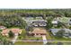 House nestled in a neighborhood, showing the property lines and surroundings at 3375 Sw 147Th Lane Rd, Ocala, FL 34473