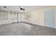 Bright living room featuring built-in shelving and tile flooring at 3375 Sw 147Th Lane Rd, Ocala, FL 34473