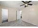 Bedroom with ceiling fan and access to another bathroom at 3375 Sw 147Th Lane Rd, Ocala, FL 34473