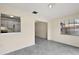 Dining room with kitchen pass-through and tile flooring at 3375 Sw 147Th Lane Rd, Ocala, FL 34473