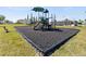 Community playground with safe surfacing and play equipment at 4953 Kaia Ave, Winter Haven, FL 33884