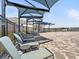 Pool deck with shaded lounge chairs and patio umbrellas at 4953 Kaia Ave, Winter Haven, FL 33884