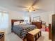 Cozy bedroom with a double bed and wood dresser, offering a tranquil atmosphere at 5 Oak Trl, Ocala, FL 34472