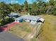 Aerial view showcasing the home's layout and surrounding landscape at 5 Oak Trl, Ocala, FL 34472