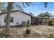 Home's backyard, with AC unit and screened porch at 642 Wheeling Ave, Altamonte Springs, FL 32714