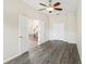 Bonus room with wood-look floors and access to living areas at 6526 Lake Pembroke Pl, Orlando, FL 32829