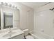 Clean bathroom with single vanity, shower/tub combo, and tile flooring at 6526 Lake Pembroke Pl, Orlando, FL 32829
