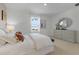 Bright bedroom with large window and plush bedding at 700 Preston Cove Dr, St Cloud, FL 34771